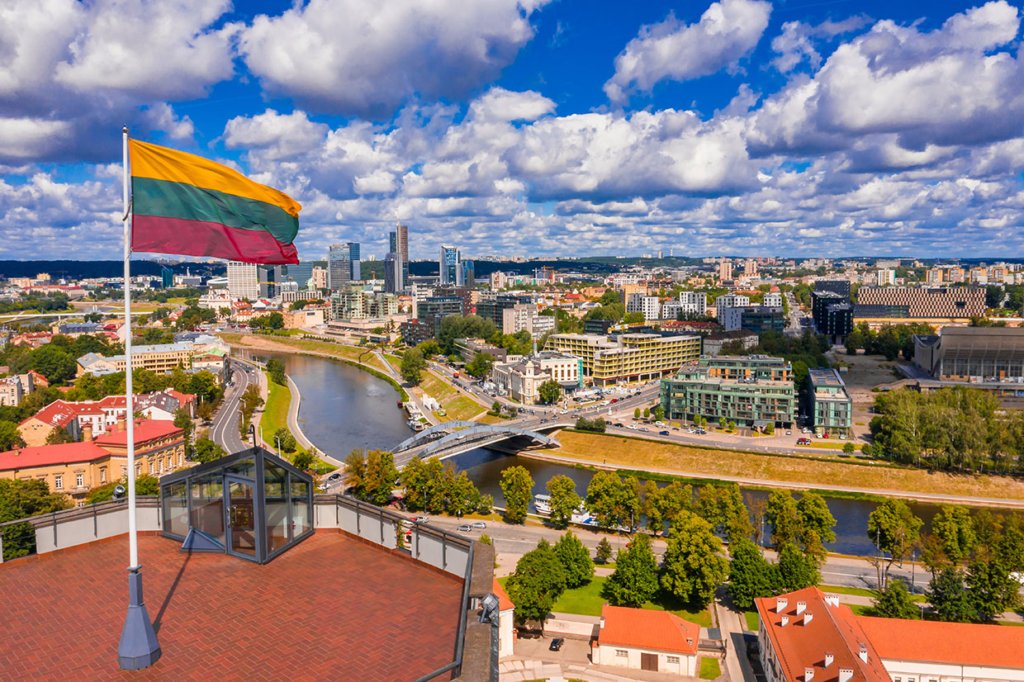 Flag of Lithuania over old town of Vilnius.